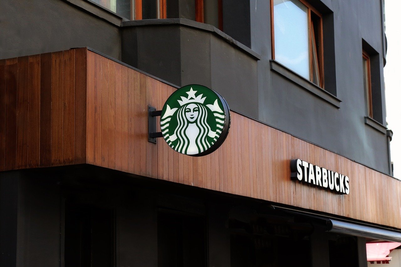 starbucks, coffee, shop, street, city, architecture, urban, advertising, building, sign, tourism, starbucks, starbucks, starbucks, starbucks, starbucks