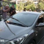 Afghan boxer arrives at Greek court in connection with death of Scottish woman