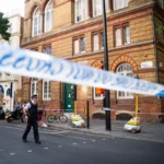 Woman charged after four men injured in Covent Garden stabbing attack