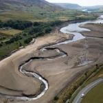 Why can rain cause flooding in a drought?