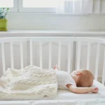 Coroner calls for baby monitor change after child died because volume was turned down