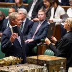 Nigel Farage breaks parliamentary rules on first day back