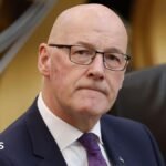 No compulsory redundancies from health board cuts – Swinney