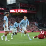 Police officer seriously injured as 10 arrested at tense Liverpool v Manchester City clash